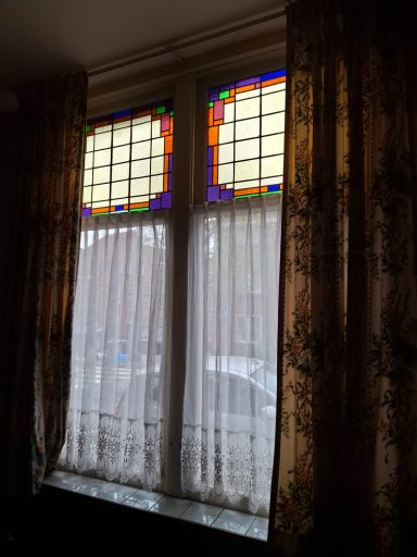 Glas in Lood Glas in lood boven enkel glas beneden